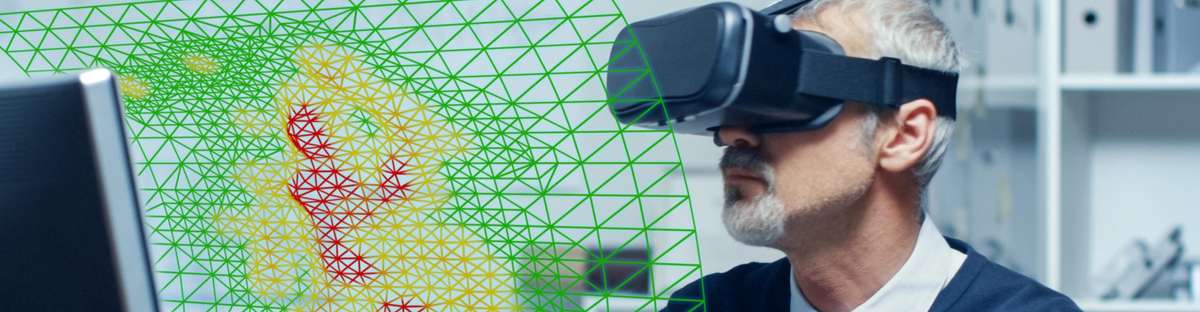 Employee wears VR-glasses, in front of him are abstractly depicted the outlines of a pipeline.