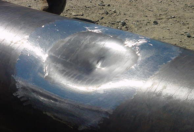 Picture of a dent in a pipeline