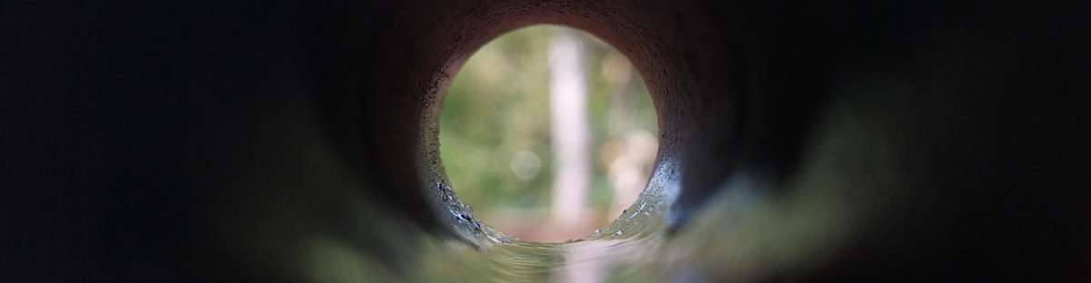 Tunnel view through a pipeline.