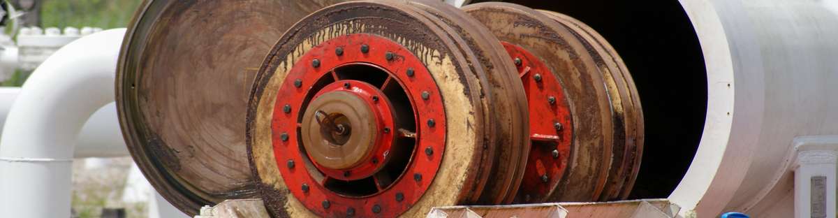 Image of a dirty pipeline cleaning tool at the receiver end of a pipeline.