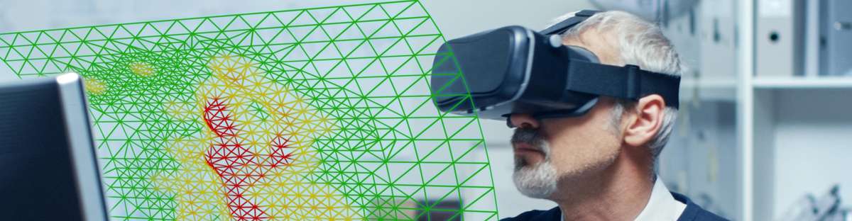 Employee wears VR-glasses, in front of him are abstractly depicted the outlines of a pipeline.