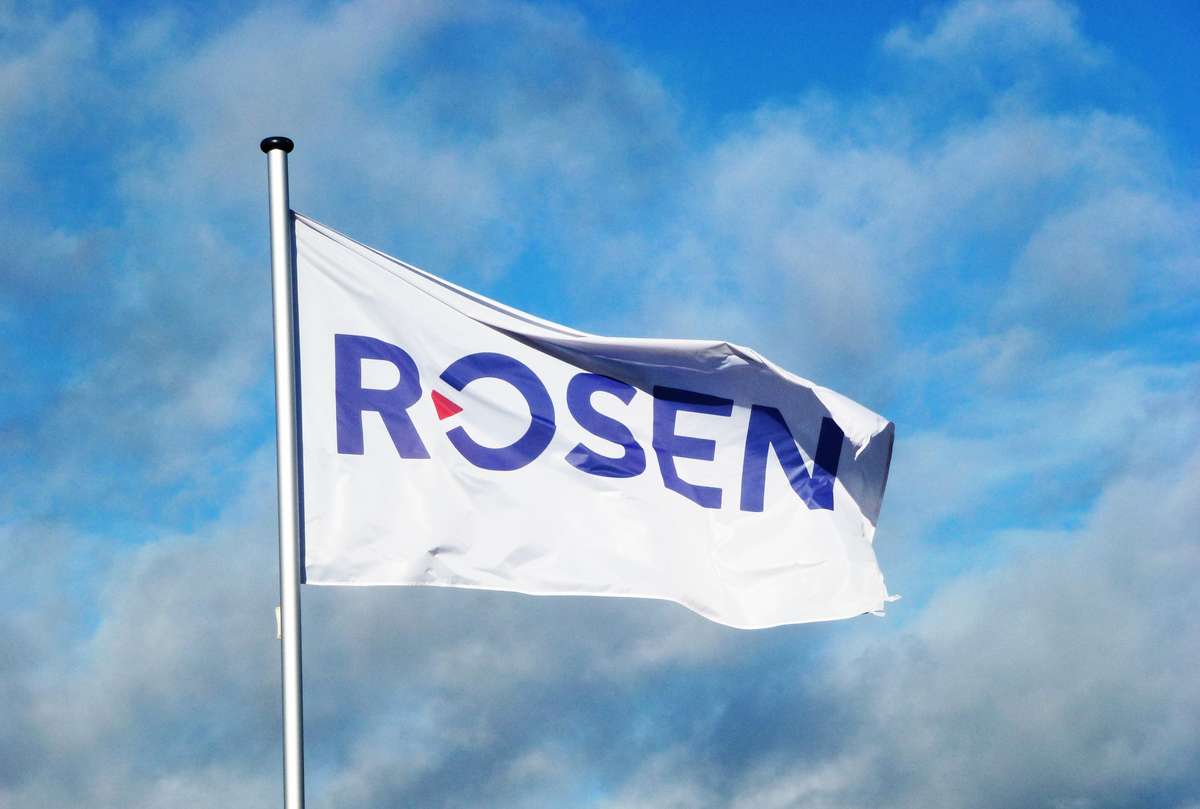 The ROSEN flag with blue sky in the background.