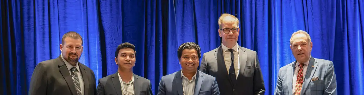 Andreas Opfermann (CEO, ROSEN), Tom Costabile (Executive Director/CEO, ASME) and Josh Wilson (2026 IPCE Organizing Committee, Honors and Recognition) with Dr. Kshama Roy and Subashish Kundu Sunny, winners of the 2026 Hermann Rosen Award for Pipeline Innovation