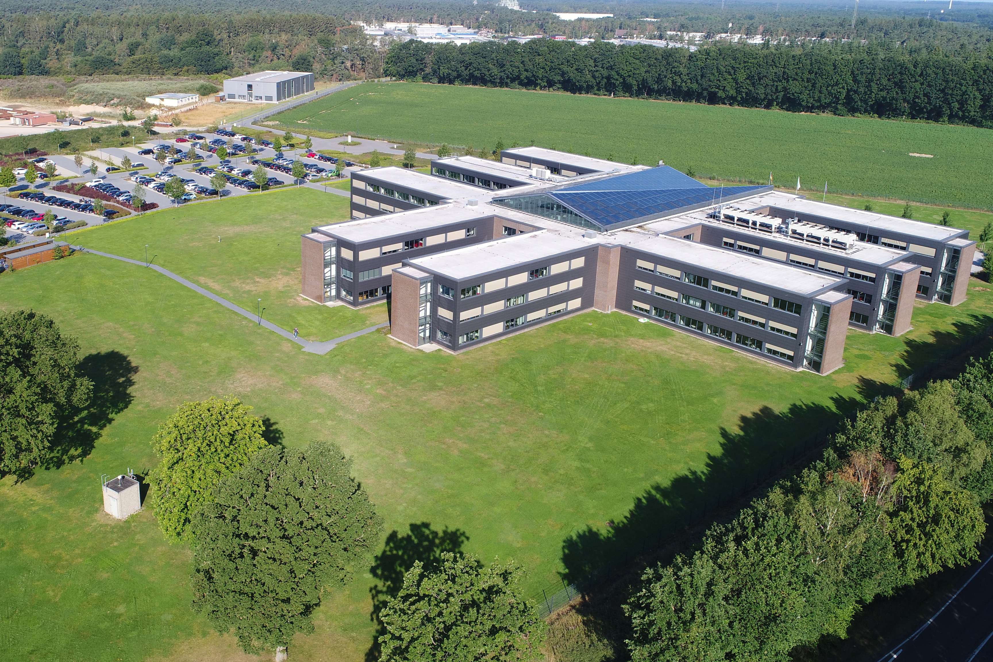 Aerial view of the building and parking lot from the site in Lingen.