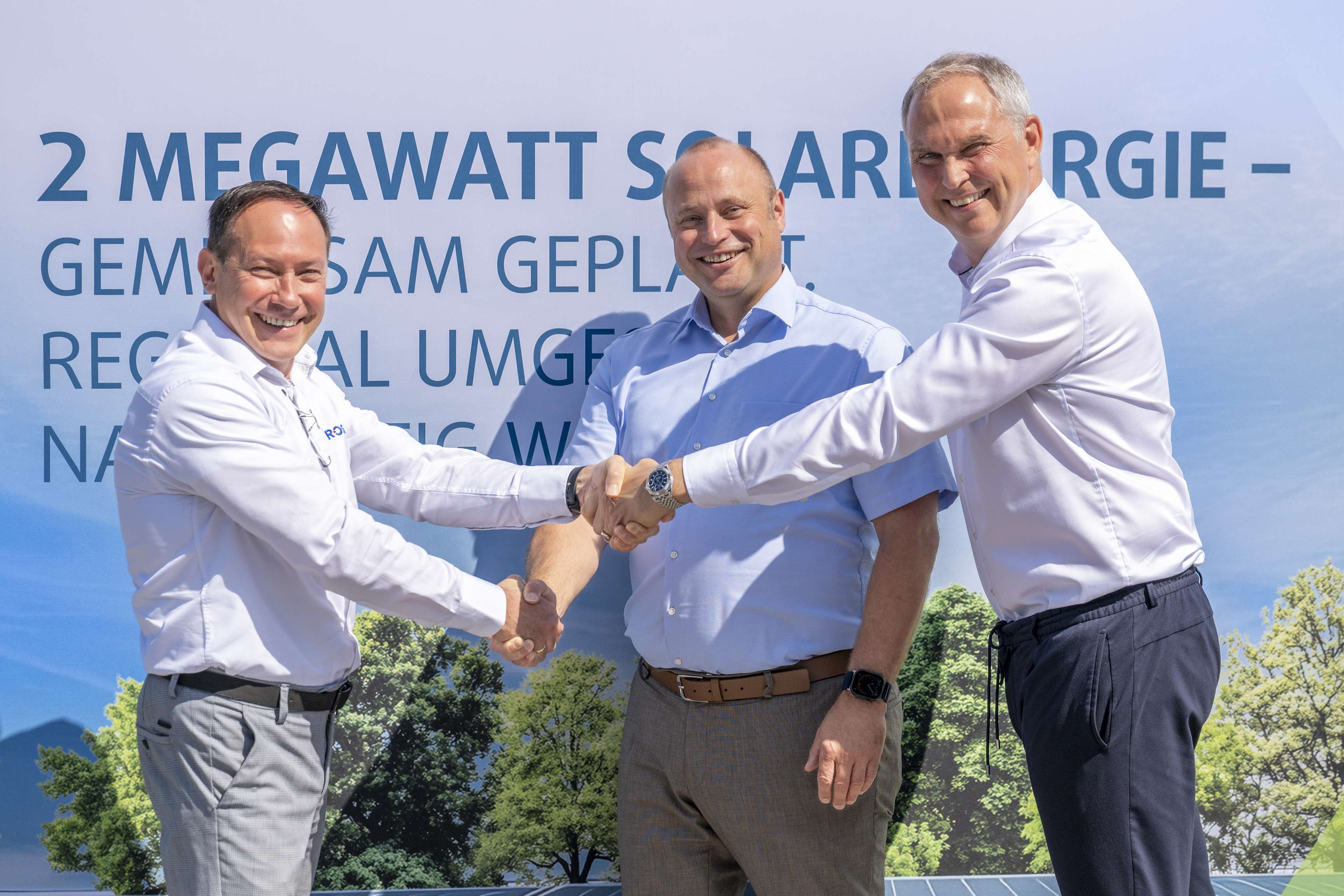 photovoltaics project team shaking hands 