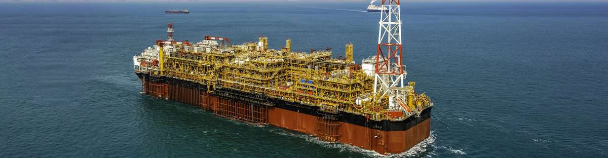 View of FPSO oil rig, floating production, storage and offloading vessel used to explore the crude oil and gas under the seabed.