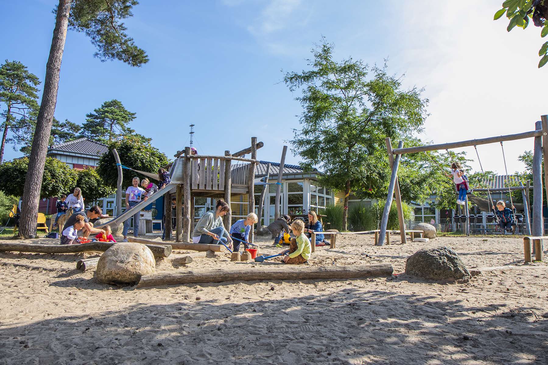 The outdoor area of ROKIDS with children playing.
