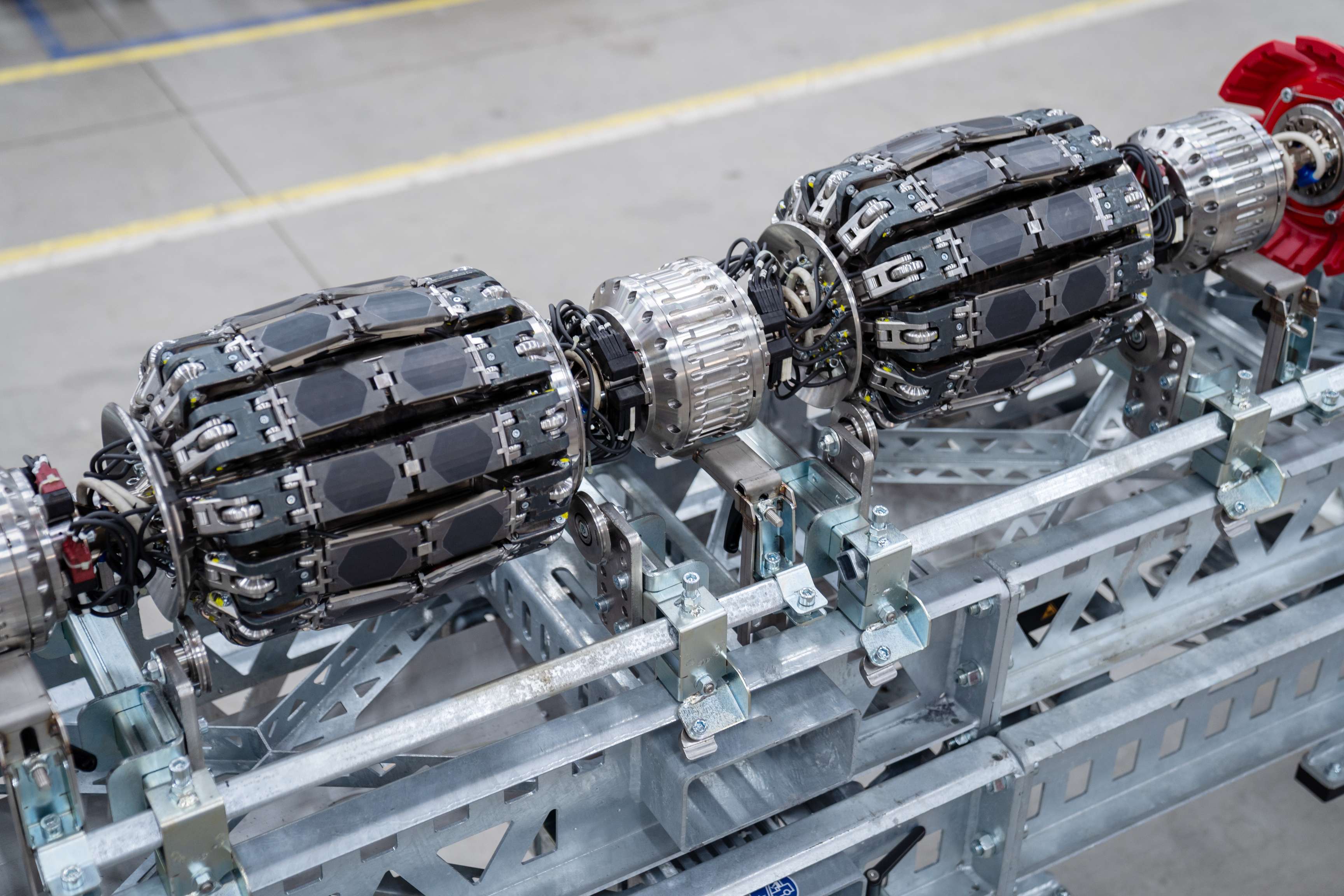 The ROSEN tool EMAT-C Ultra laying on a steel stand and photographed from above.
