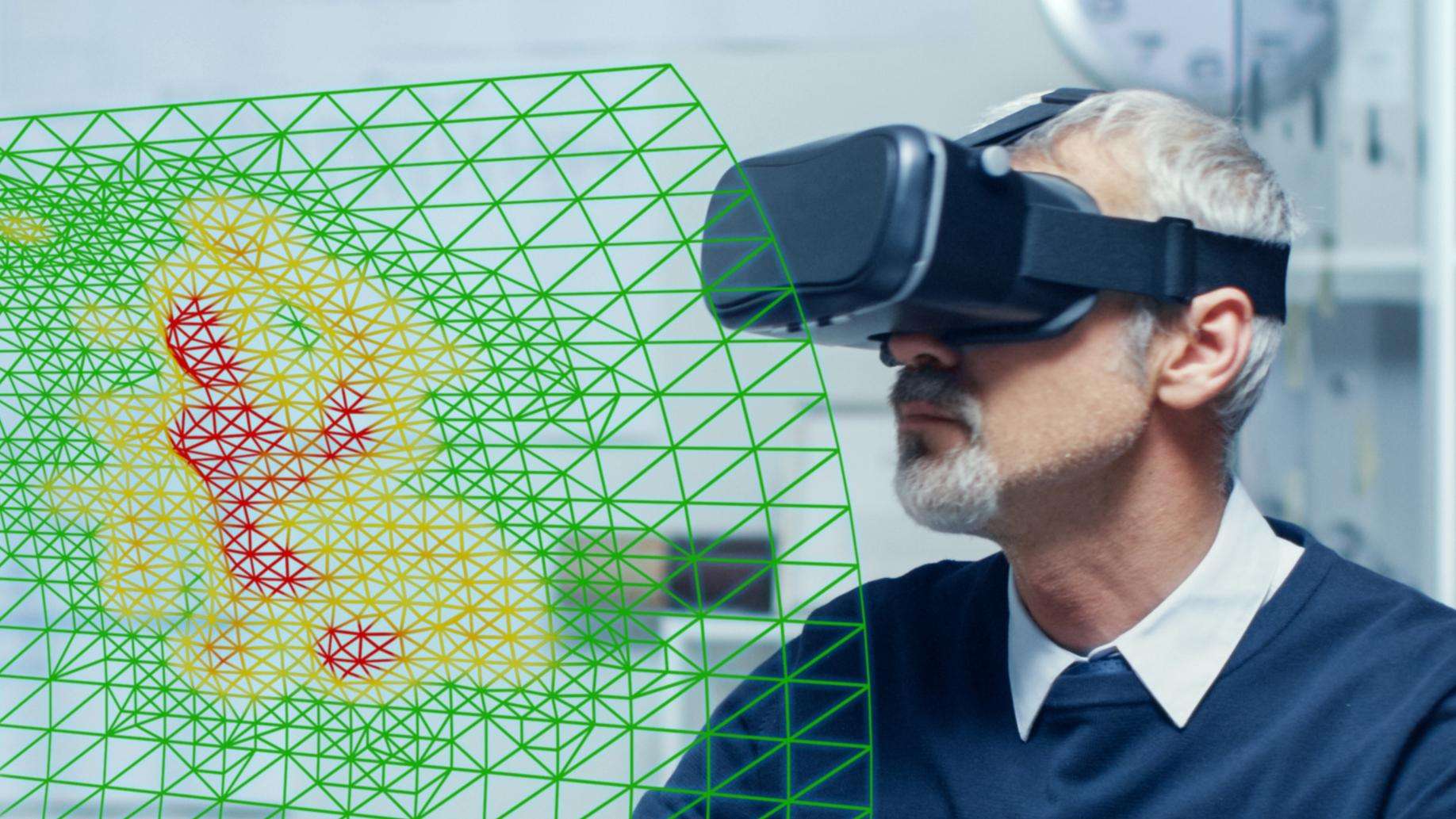 Employee wears VR-glasses, in front of him are abstractly depicted the outlines of a pipeline.