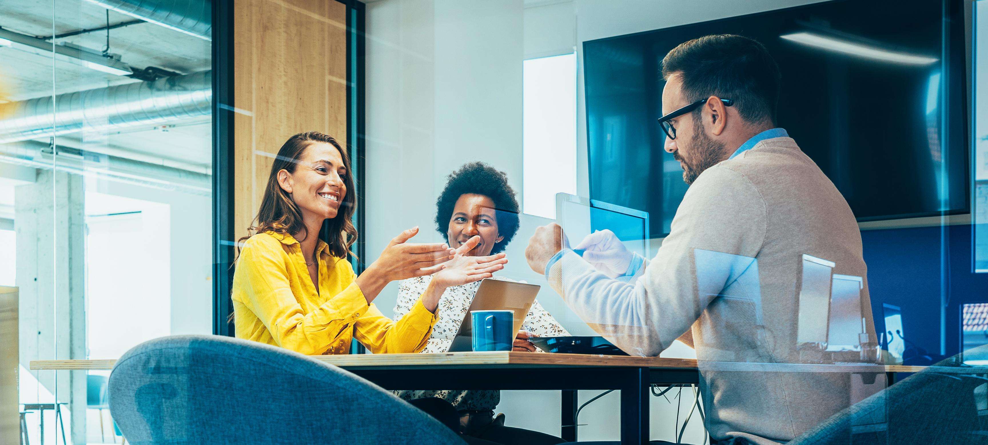 Group of employees sitting in an office environment