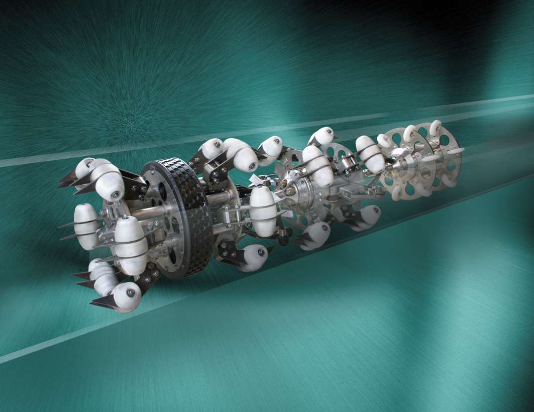 ROSEN tool running through transparent pipeline in front of a green background.