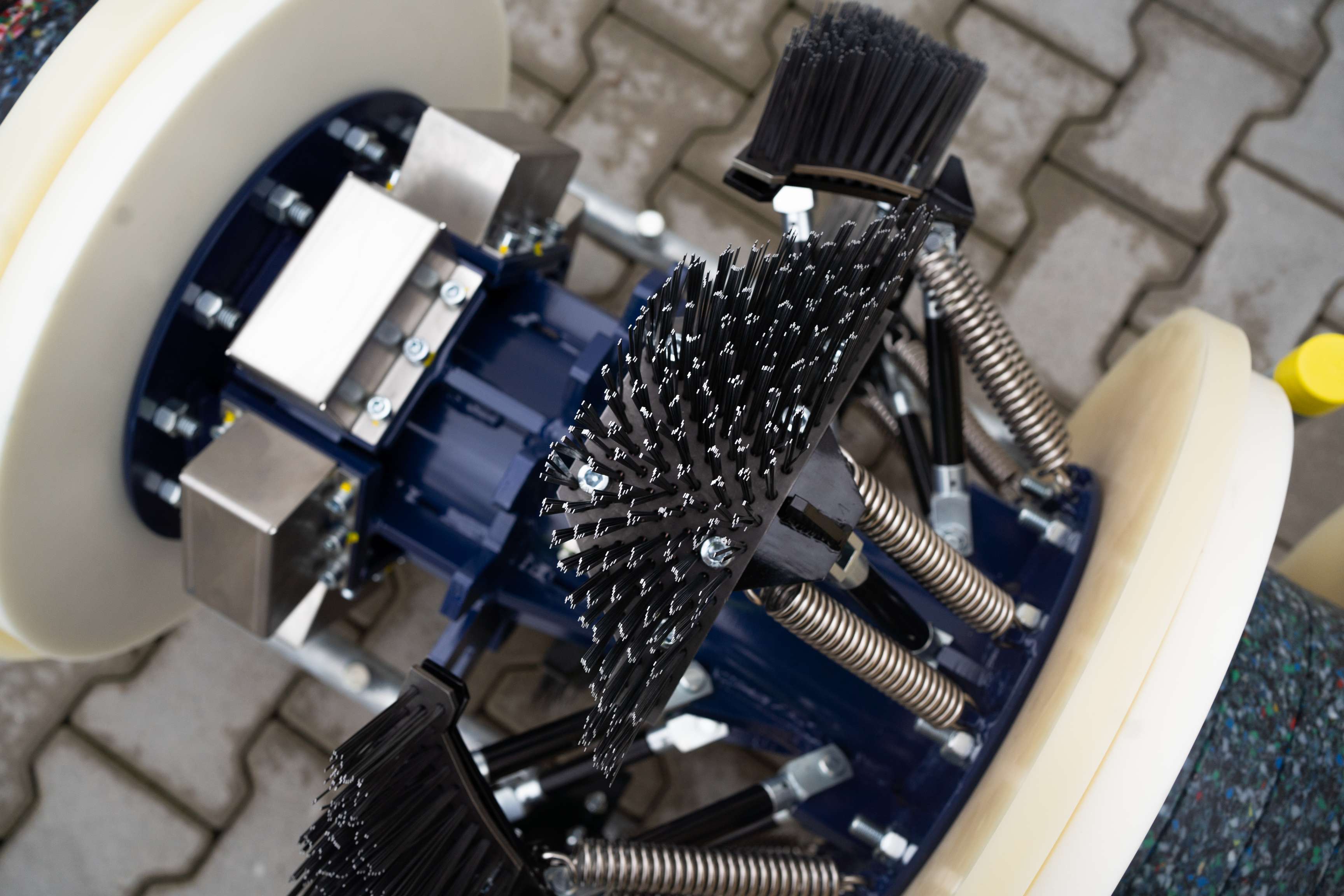 Close up of a heavy duty cleaning pig showing the brush. 