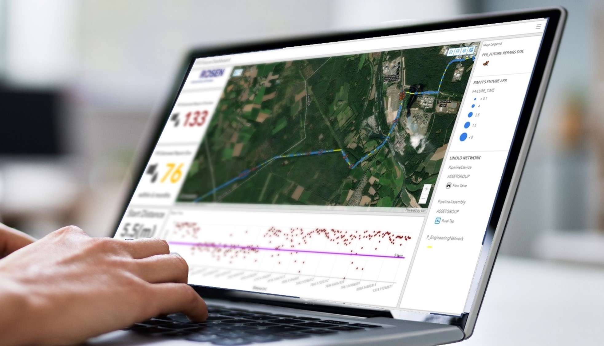 Hand is writing on a notebook with NIMA software