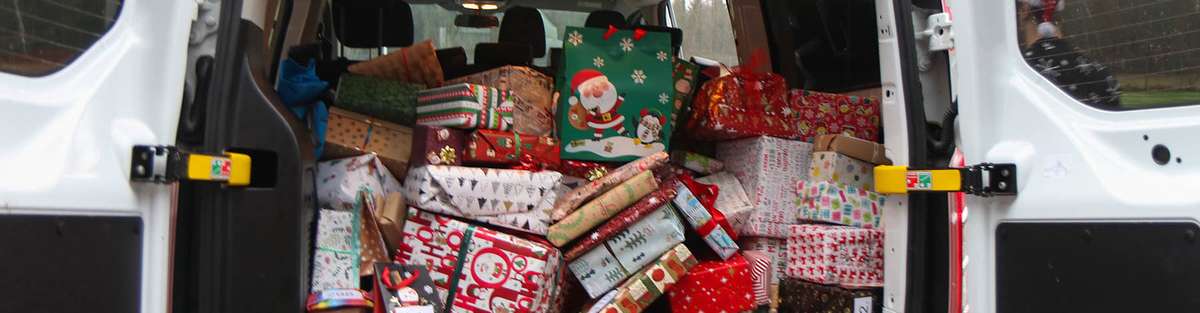 A car filled with Christmas presents.