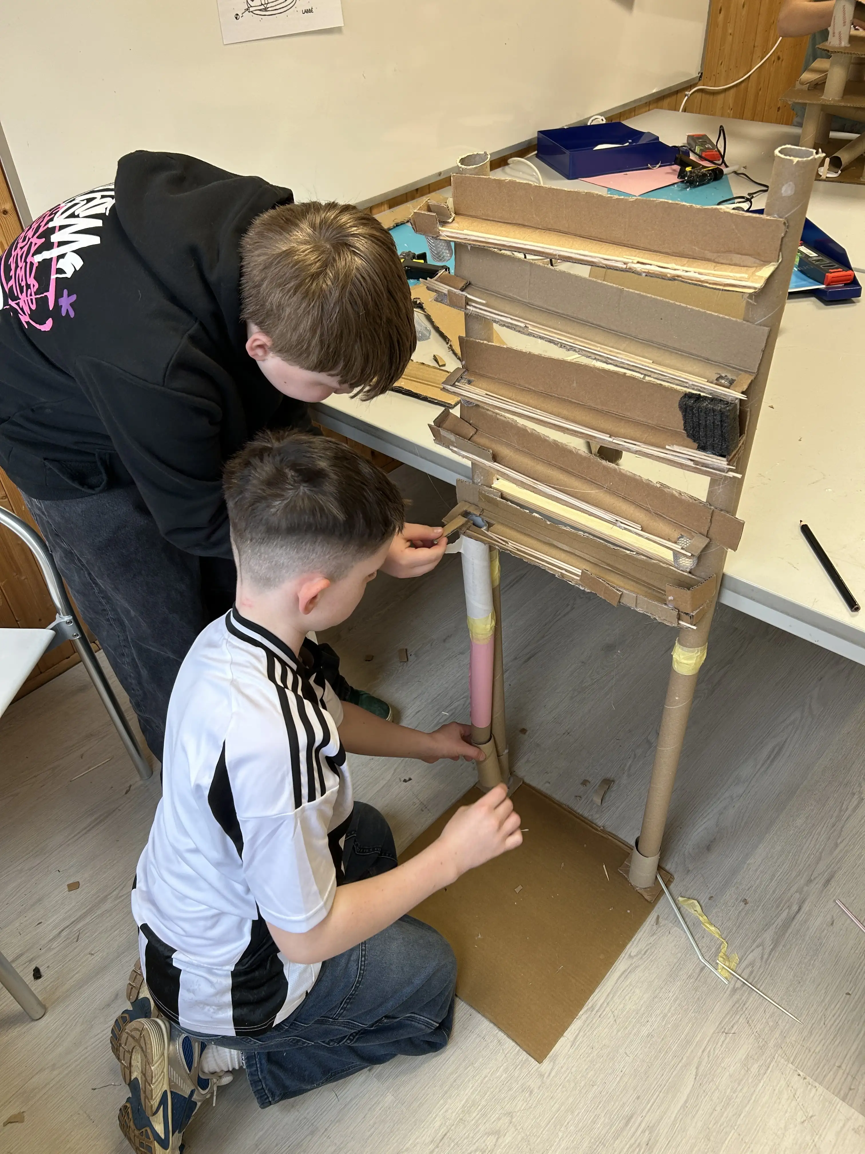 A wooden marble run.