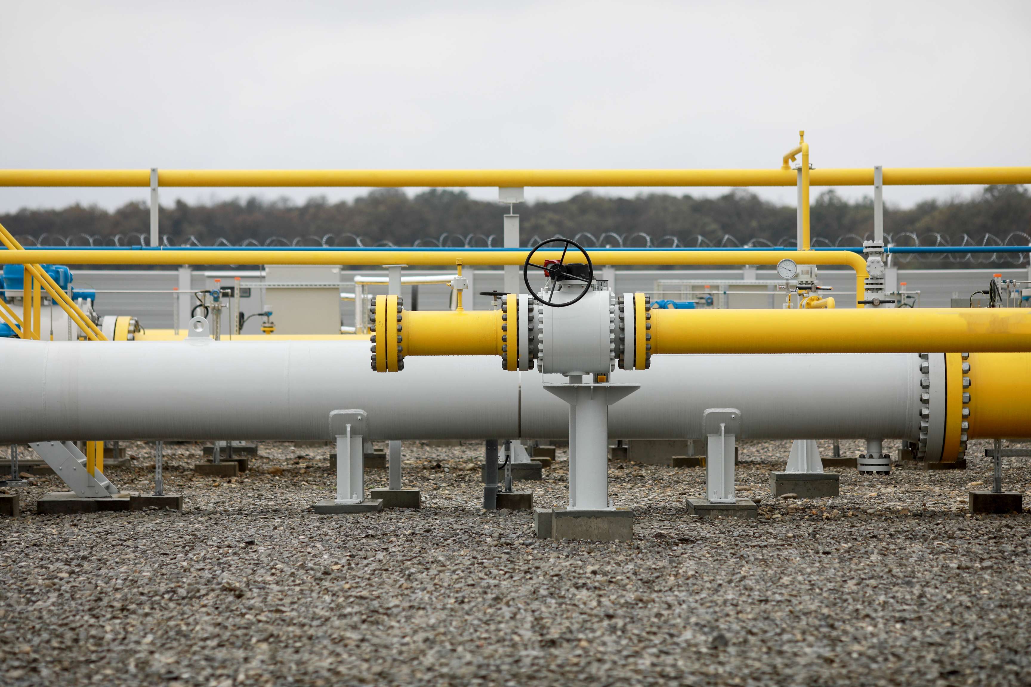 Pipes and other industrial equipment in a natural gas compressor station.
