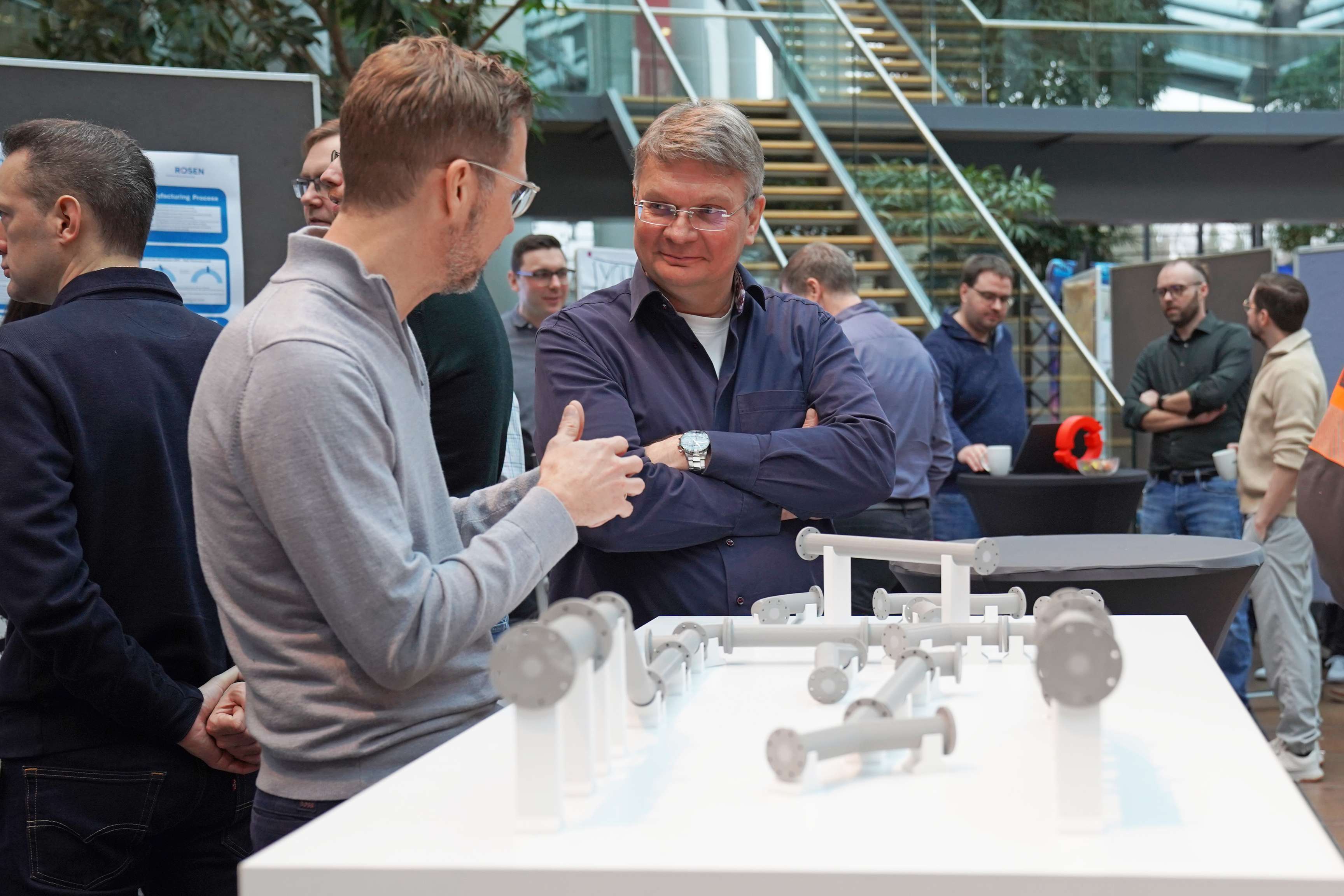 Employees exchange ideas about ROSEN's solutions on Creation Day